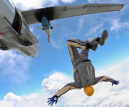 A person experiencing air resistance after jumping out of a plane.