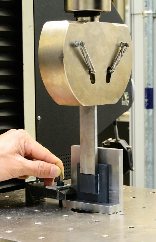 Tension tests use pulling forces, usually administered by a machine that has been specially calibrated, to test a material's strength.