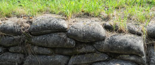 Volunteers will frequently build flood walls using sandbags when flooding is imminent.