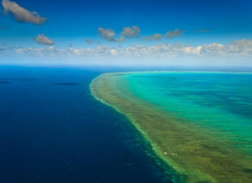 The Great Barrier Reef is located off the coast of Queensland.