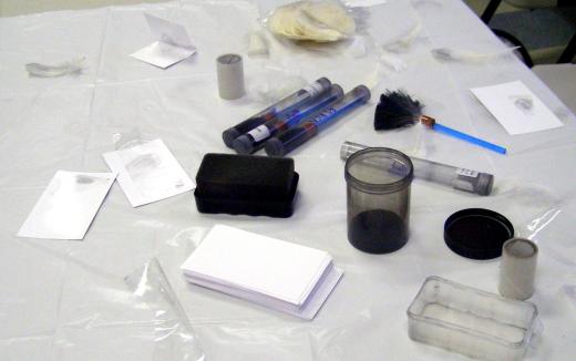 A fingerprinting kit may be used to lift latent fingerprints.