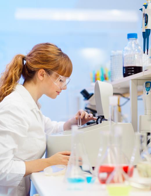 Scientists test earth elements in a geotechnical laboratory.