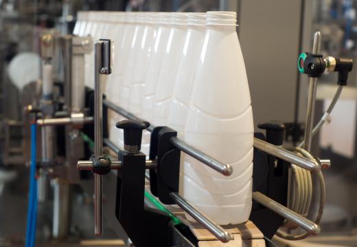 A dairy processing plant may sample and test each batch of milk for safety and quality before it is bottled.